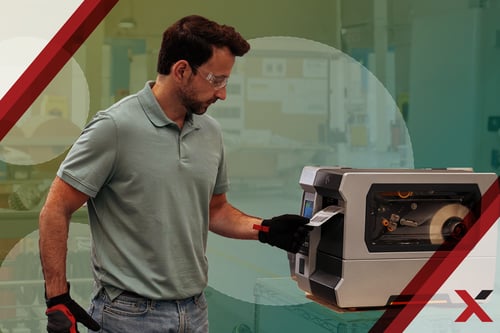 Man working with an Industrial Thermal Printer